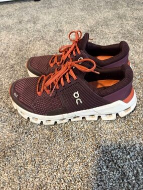 On Cloud Running Shoes in Plum with Orange Laces